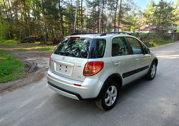 Suzuki SX4 cena 26990 przebieg: 170000, rok produkcji 2009 z Stepnica małe 379